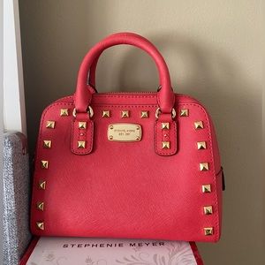 Coral bag in pristine condition never used.